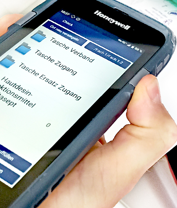 Handheld Auto-ID scanning device in use